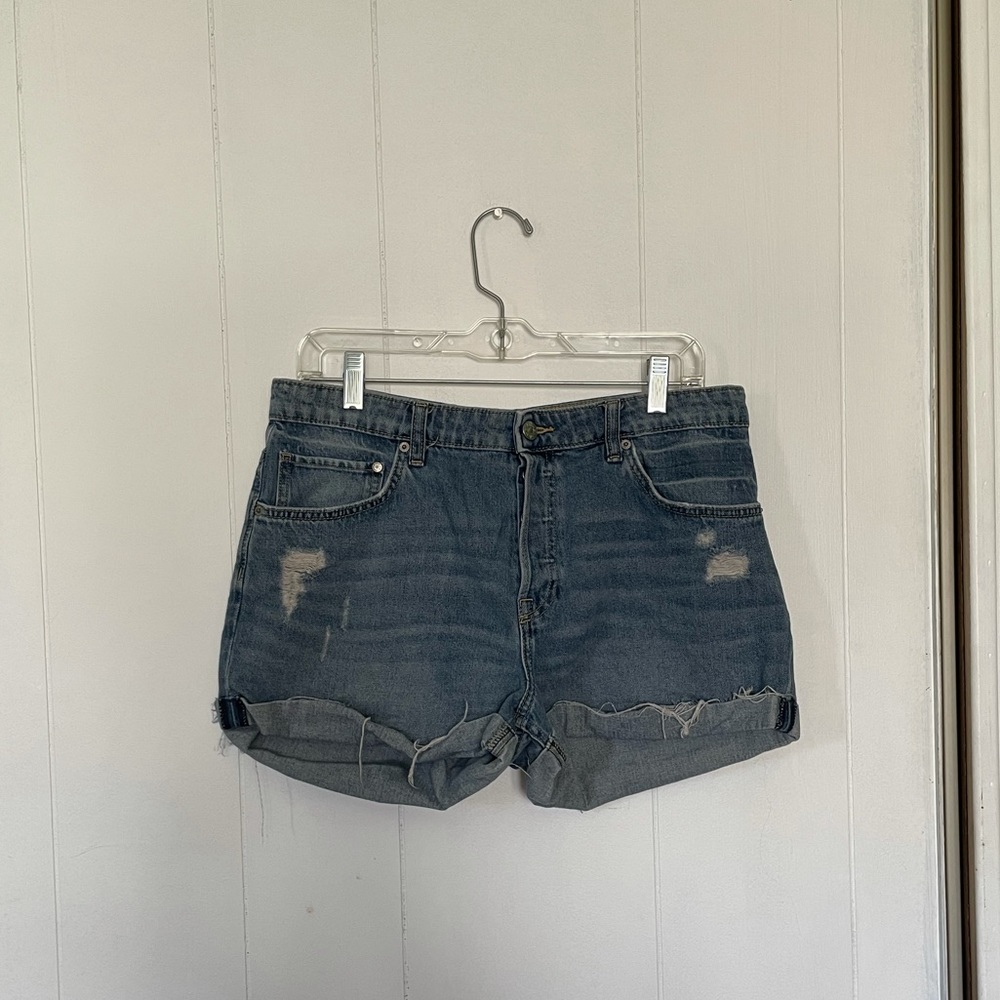 Button fly cuffed mid wash shorts